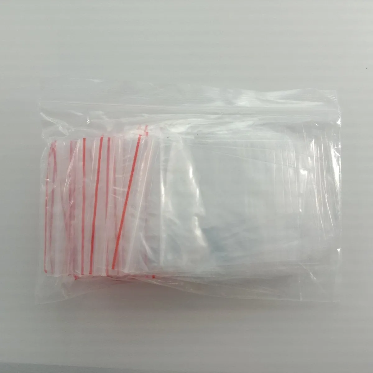100pcs 6x8cm Clipseal Sealer Small Plastic Zip Bags Thin Satchels