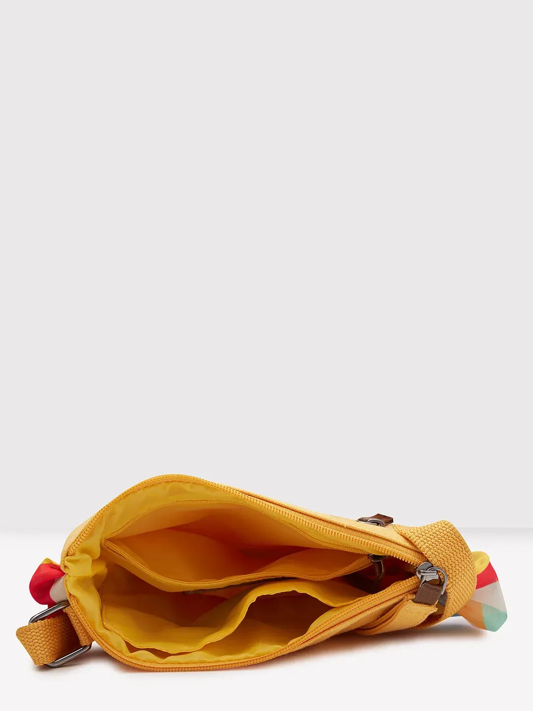 Caprese Oakley Medium Marigold Sling Bag