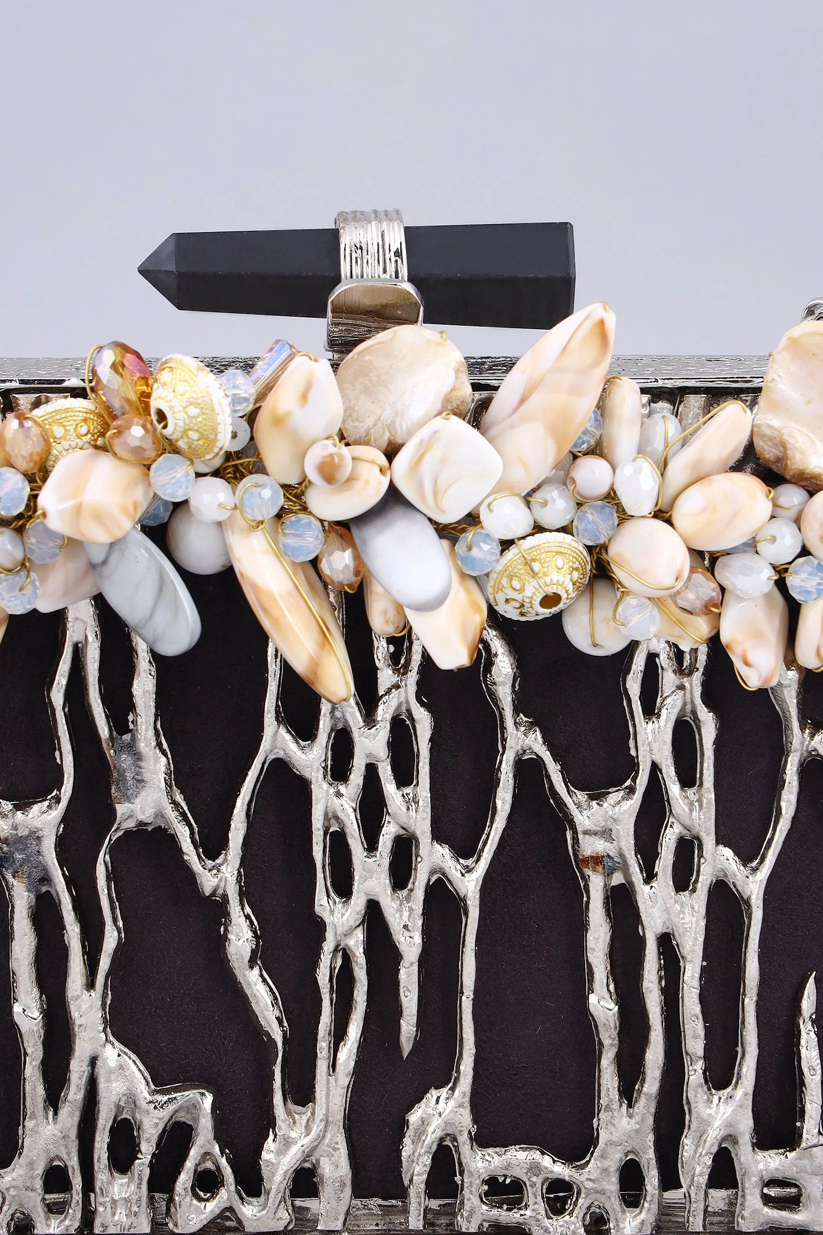 Tanaz silver Statement clutch