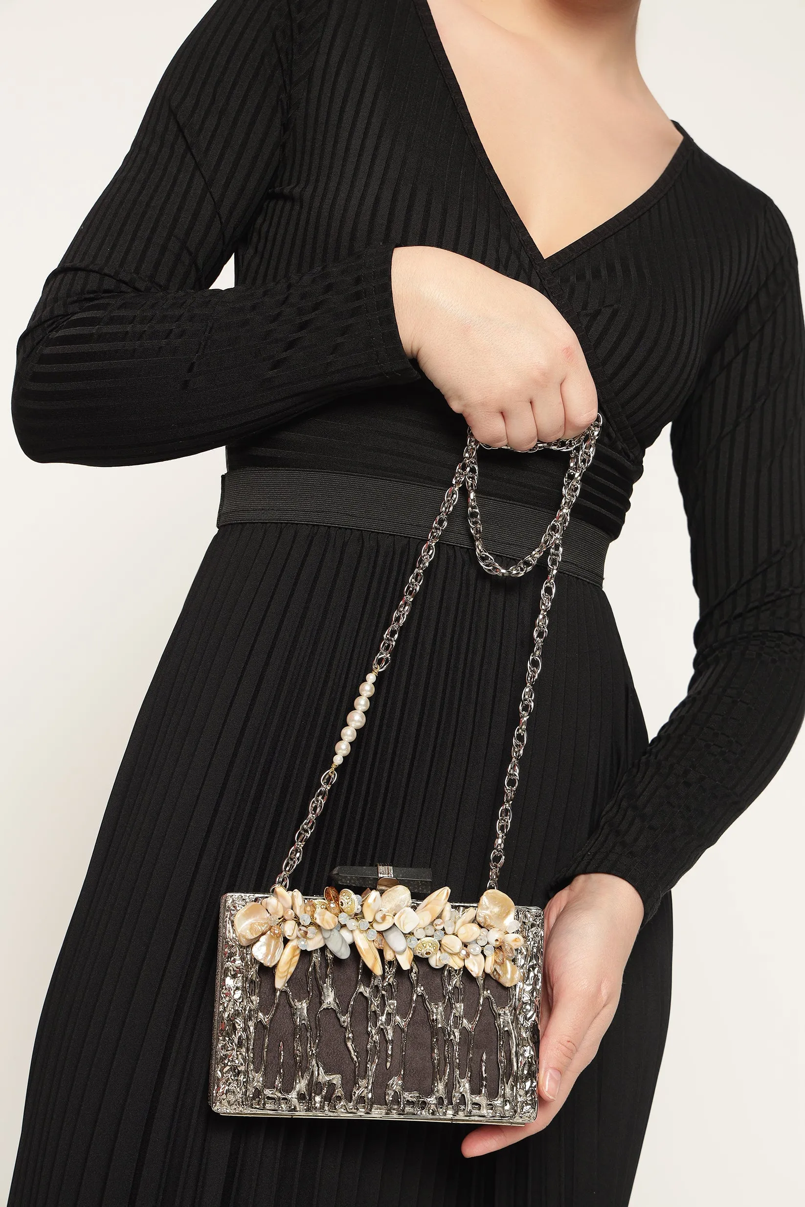 Tanaz silver Statement clutch
